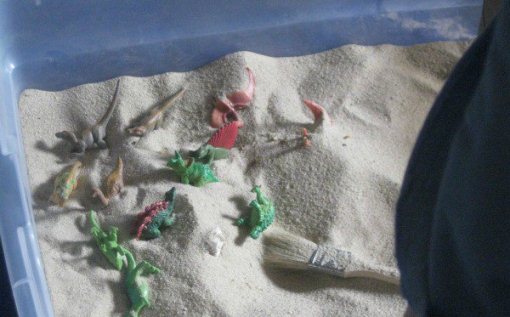 Dinosaurios en la arena
